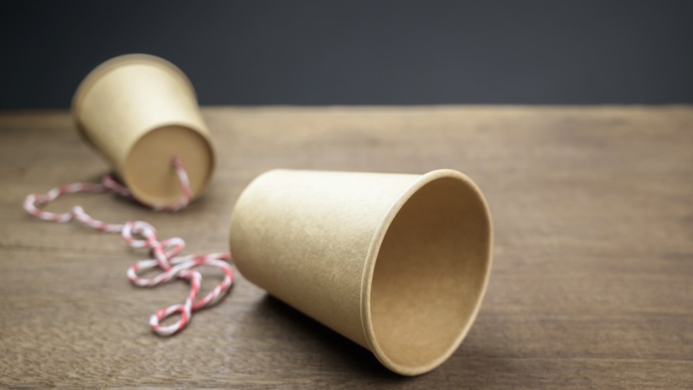 Paper cups joined with a string
