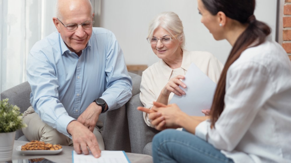 Older workers discussing options with an employer