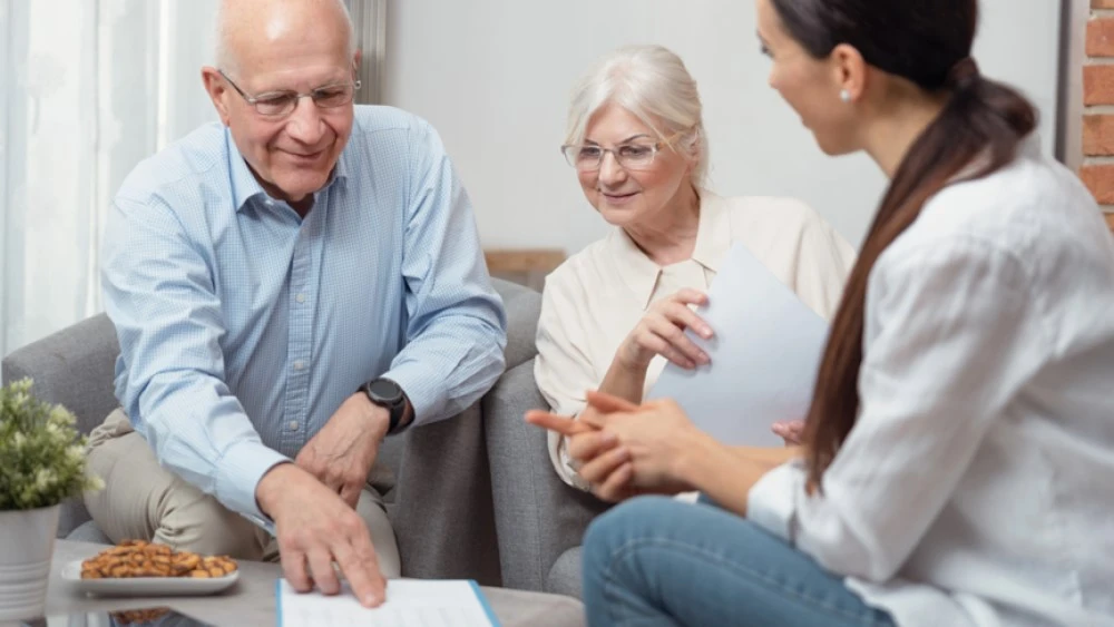 Older workers discussing options with an employer
